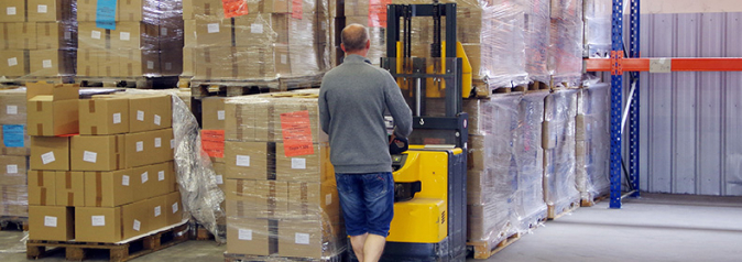 man unloading truck on dock